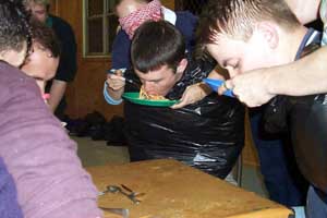Brad Andrew and others dig in face and all in the Spaghetti challenge