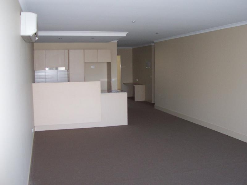 Living Room towards Kitchen from NW corner.